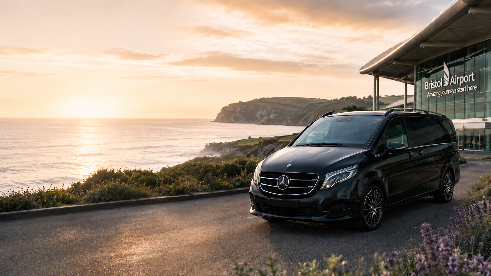 Mercedes V Class Exclusive at Bristol Airport with Devon coastal scenery at golden sunset
